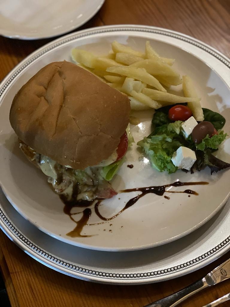 Burger with fries and side salad