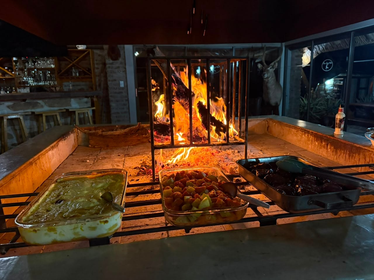 Boma fire grill outdoor dining setup